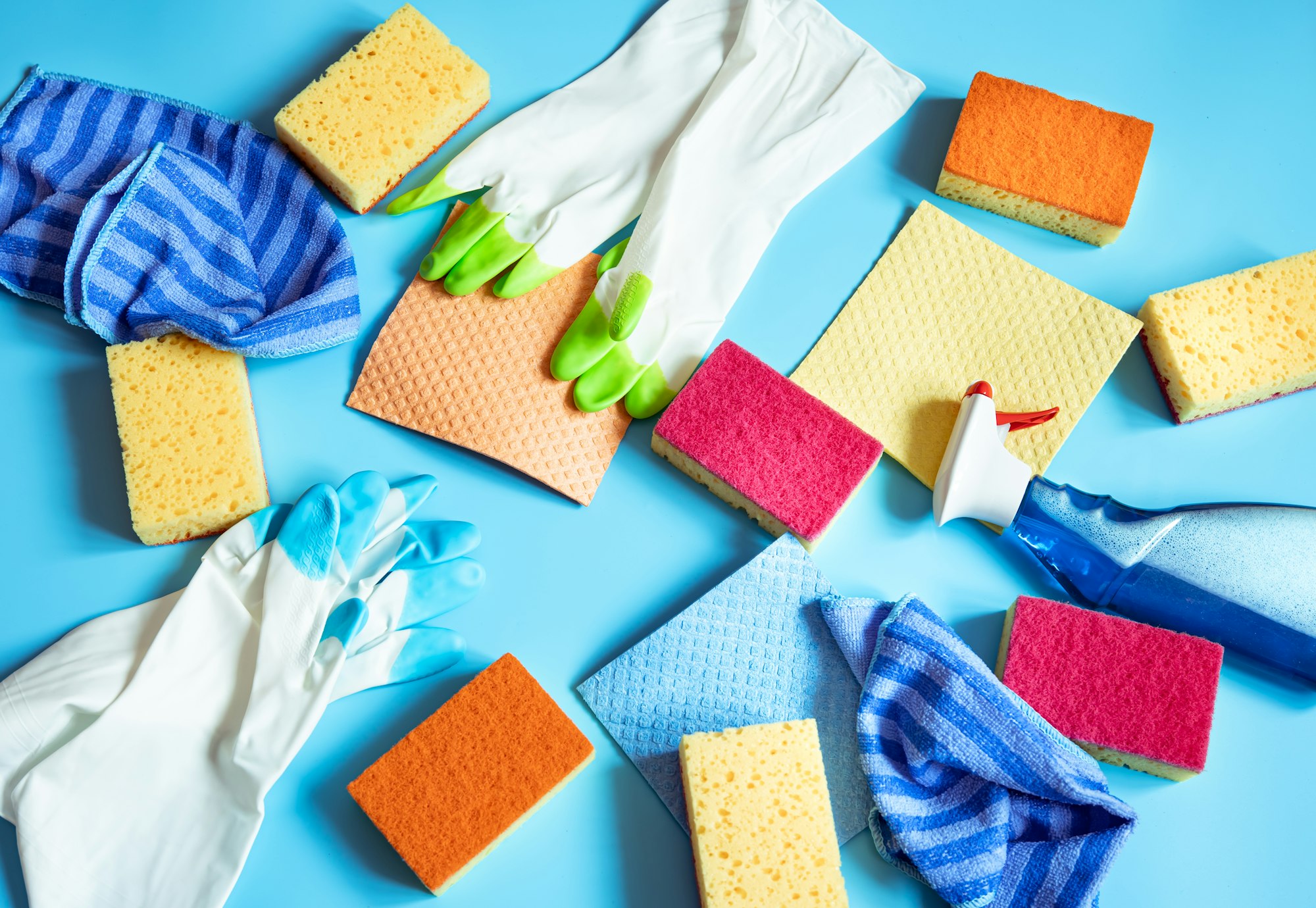 Colorful composition with accessories for cleaning the house.